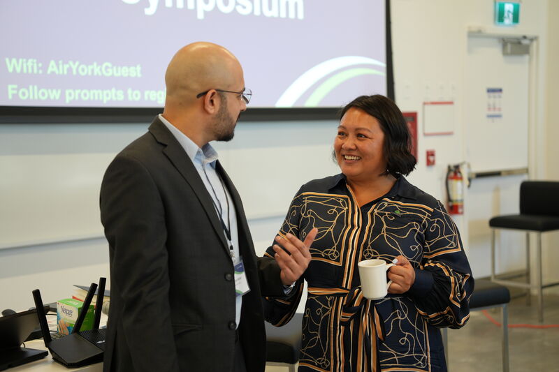 Networking conversation between two attendees